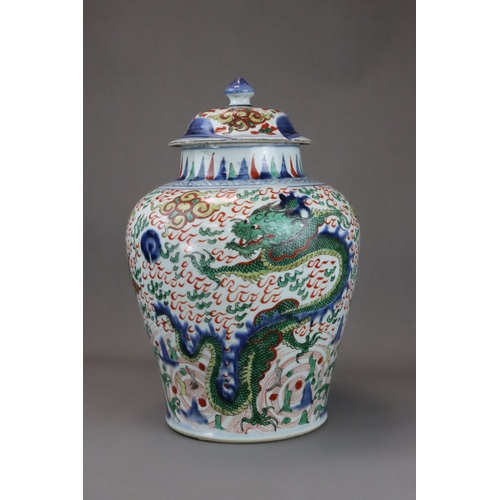 109 - A Striking Wucai Baluster Dragon Jar and Cover, Shunzhi, richly decorated in strong enamels and dark... 