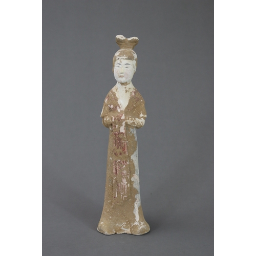 12 - A Painted Pottery Figure of a Lady, Tang dynasty modelled from red pottery, the lady with high hair ... 