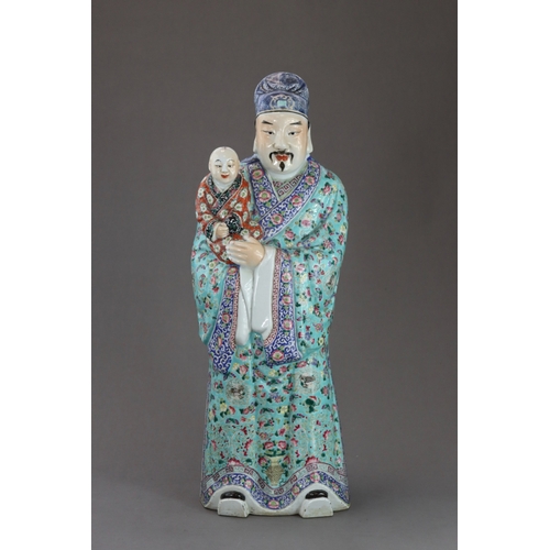 122 - A Large 'famille rose' Figure of a Gentleman and Child, Republic period,  the man clad in a turquois... 