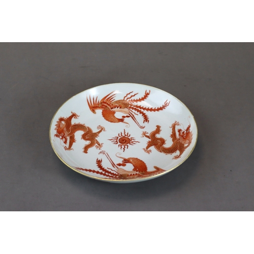 123 - A Dragon and Phoenix Dish, Jiaqing six character seal mark in underglaze blue and of the period,  we... 