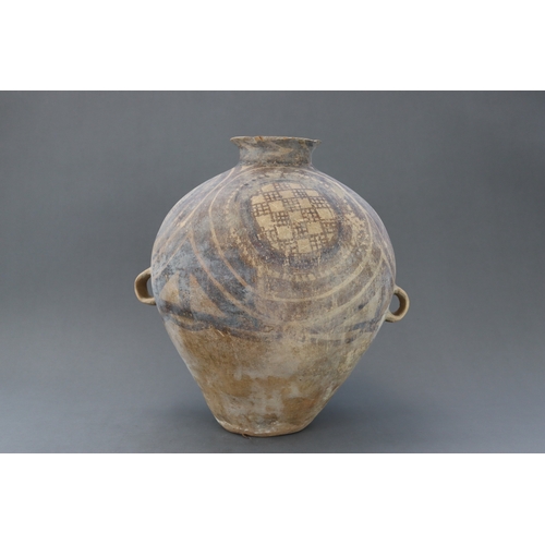 13 - A Majiayao Painted Pottery Handled Jar, Majiayao Culture, Machang Phase the ovoid body surmounted by... 