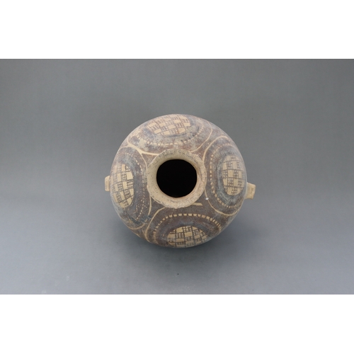 13 - A Majiayao Painted Pottery Handled Jar, Majiayao Culture, Machang Phase the ovoid body surmounted by... 