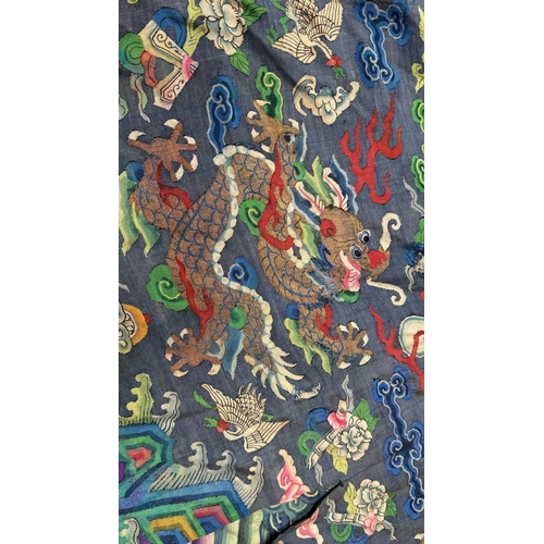 139 - A Silk Kesi Dragon Robe, 19th Century brightly worked with five - clawed dragons in gilt and colours... 