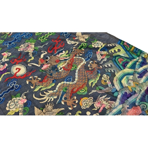 139 - A Silk Kesi Dragon Robe, 19th Century brightly worked with five - clawed dragons in gilt and colours... 