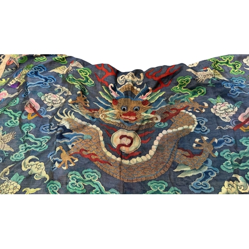 139 - A Silk Kesi Dragon Robe, 19th Century brightly worked with five - clawed dragons in gilt and colours... 