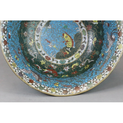 142 - A Ming Cloisonne Bowl with Waterbirds, 16th century well decorated in rich tones on the interior wit... 