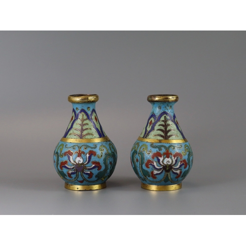 147 - An Attractive Pair of Cloisonne Vases, Qianlong,  of rounded pear shape below a galleried gilt rim, ... 