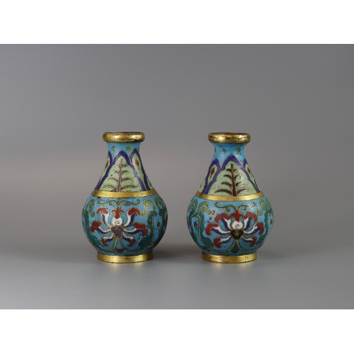 147 - An Attractive Pair of Cloisonne Vases, Qianlong,  of rounded pear shape below a galleried gilt rim, ... 