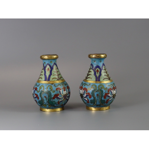 147 - An Attractive Pair of Cloisonne Vases, Qianlong,  of rounded pear shape below a galleried gilt rim, ... 