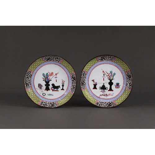 155 - A Pair of Canton Enamel Saucer Dishes, Qianlong,  each finely enamelled with a central medallion of ... 