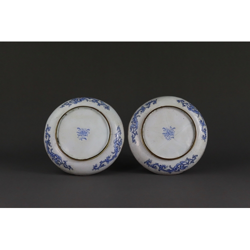 155 - A Pair of Canton Enamel Saucer Dishes, Qianlong,  each finely enamelled with a central medallion of ... 