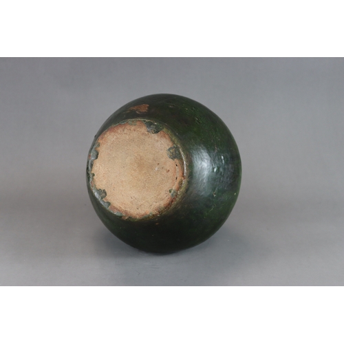 16 - A Green glazed Pottery Vase, hu, Han dynasty moulded in low relief around the shoulder beneath  the ... 