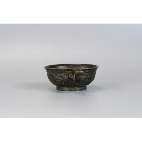 161 - A Rare Bronze Cup, 16th/17th century,  in the Hu Wenming manner, the shallow rounded vessel set with... 