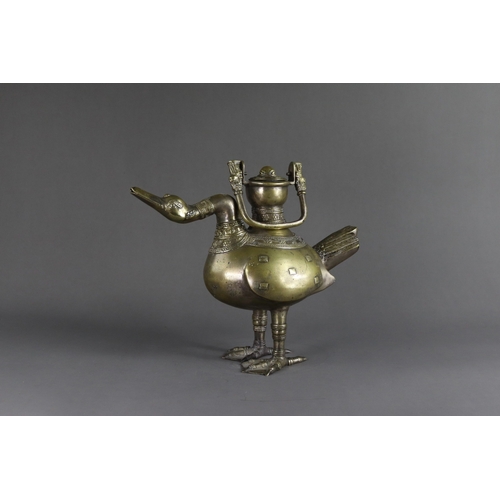 162 - A Bronze Ewer  and Cover in the form of a Goose, Ming dynasty or earlier,  the standing bird cast  w... 