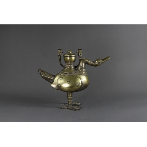 162 - A Bronze Ewer  and Cover in the form of a Goose, Ming dynasty or earlier,  the standing bird cast  w... 