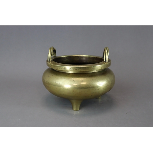 164 - A Bronze Tripod Censer, liding, 18th century,  solidly cast, with polished patina, the bombe sides t... 