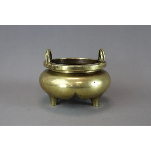 164 - A Bronze Tripod Censer, liding, 18th century,  solidly cast, with polished patina, the bombe sides t... 