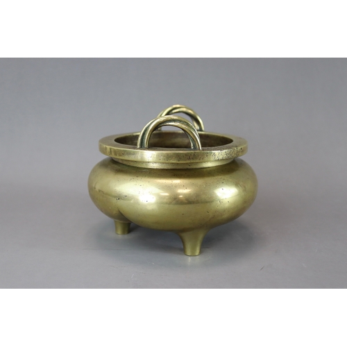 164 - A Bronze Tripod Censer, liding, 18th century,  solidly cast, with polished patina, the bombe sides t... 