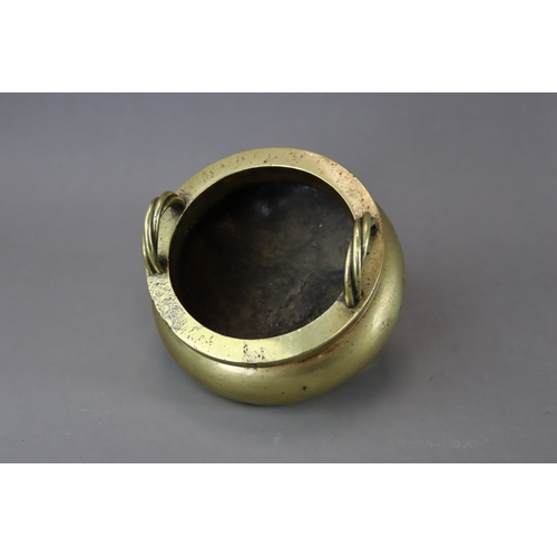 164 - A Bronze Tripod Censer, liding, 18th century,  solidly cast, with polished patina, the bombe sides t... 