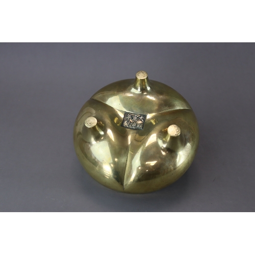 164 - A Bronze Tripod Censer, liding, 18th century,  solidly cast, with polished patina, the bombe sides t... 