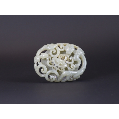 178 - A Jade Double Chilong Plaque, Ming dynasty,  of slightly domed oval form, softly carved in deep open... 