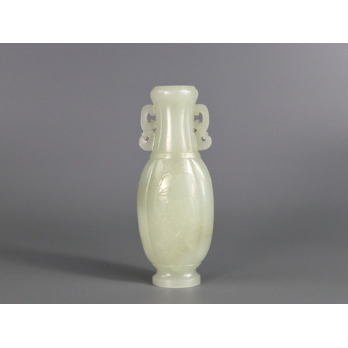 179 - A  Well Carved White Jade Vase, Qianlong/ Jiaqing, of flattened lobed ovoid form, each side decorate... 