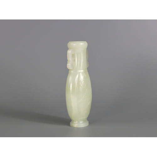 179 - A  Well Carved White Jade Vase, Qianlong/ Jiaqing, of flattened lobed ovoid form, each side decorate... 