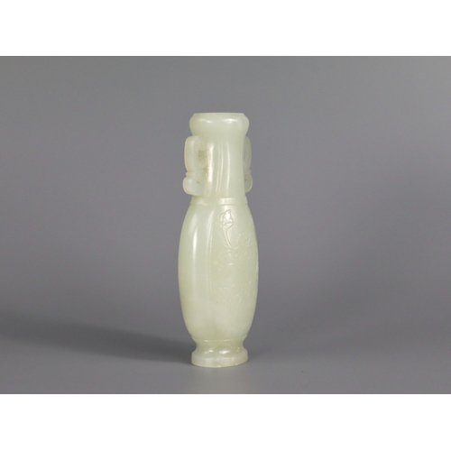 179 - A  Well Carved White Jade Vase, Qianlong/ Jiaqing, of flattened lobed ovoid form, each side decorate... 