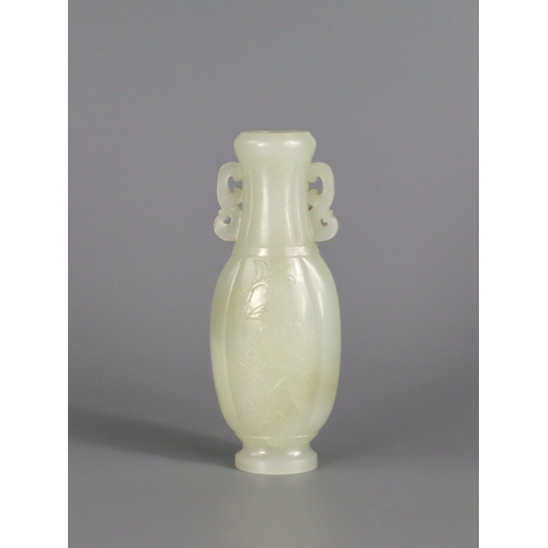 179 - A  Well Carved White Jade Vase, Qianlong/ Jiaqing, of flattened lobed ovoid form, each side decorate... 