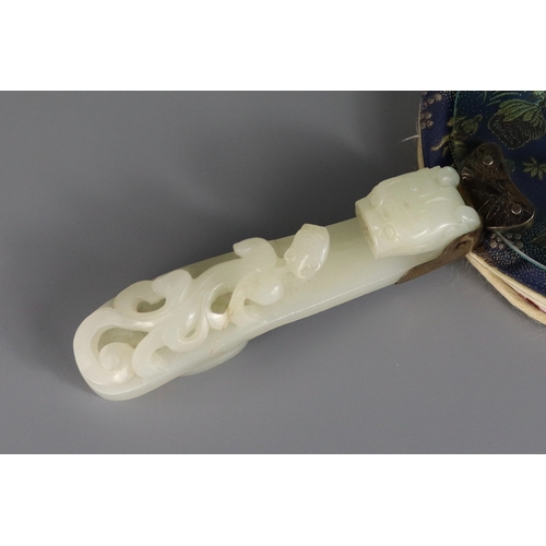 181 - A White Jade Dragon Belthook, mid Qing dynasty, mounted c.1920 as the handle of a magnifying glass, ... 