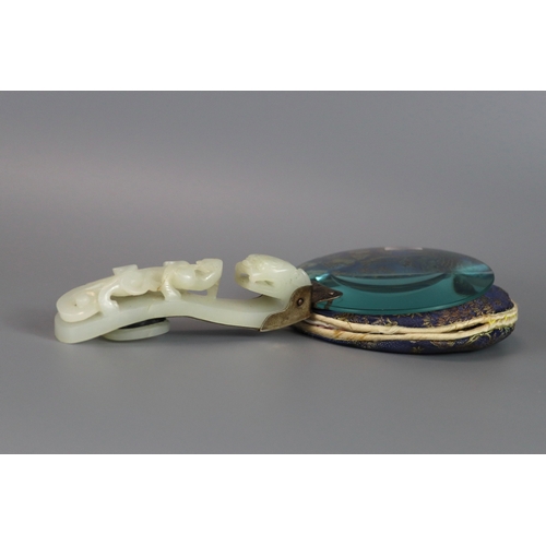 181 - A White Jade Dragon Belthook, mid Qing dynasty, mounted c.1920 as the handle of a magnifying glass, ... 