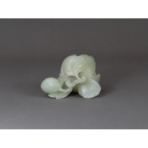 183 - A Pale Celadon Jade Peony Waterpot, 18/19th century,  well carved with the the main bloom opening to... 