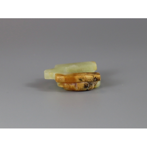 185 - A Jade Chilong Pendant, Yuan/Ming dynasty,  well carved in low pierced relief with a coiled chilong ... 