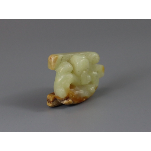 185 - A Jade Chilong Pendant, Yuan/Ming dynasty,  well carved in low pierced relief with a coiled chilong ... 