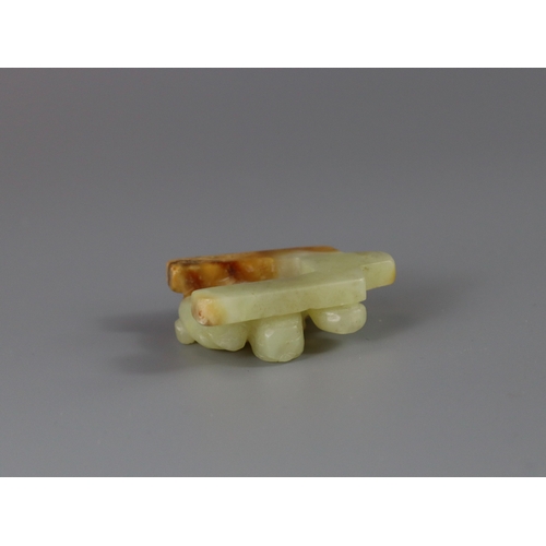 185 - A Jade Chilong Pendant, Yuan/Ming dynasty,  well carved in low pierced relief with a coiled chilong ... 