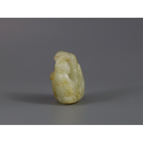 186 - A Good Jade Shoulao Group, Ming dynasty,  the white stone with extensive areas of russet skin, finel... 