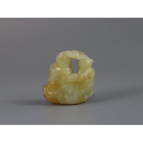 186 - A Good Jade Shoulao Group, Ming dynasty,  the white stone with extensive areas of russet skin, finel... 