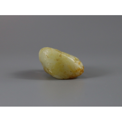 186 - A Good Jade Shoulao Group, Ming dynasty,  the white stone with extensive areas of russet skin, finel... 