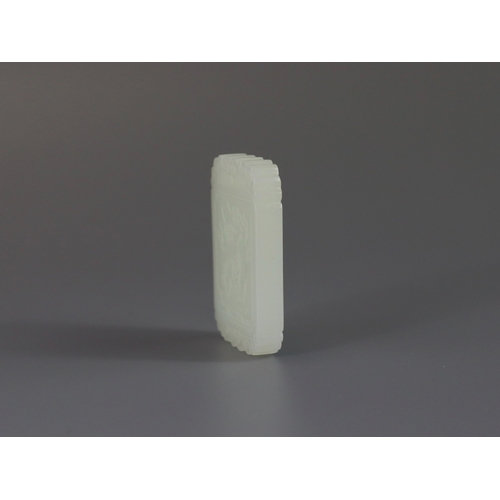 188 - A Fine White Jade Pendant, 19/20th century   the rectangular plaque well carved in low relief on one... 