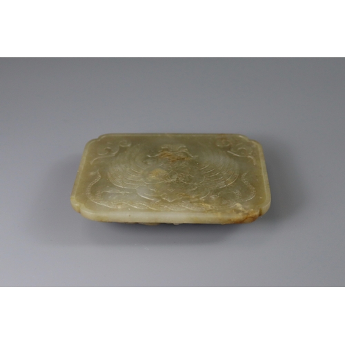 189 - A Jade Dragon Belt Plaque,Ming dynasty,  of rectangular form, the olive green stone  with some areas... 