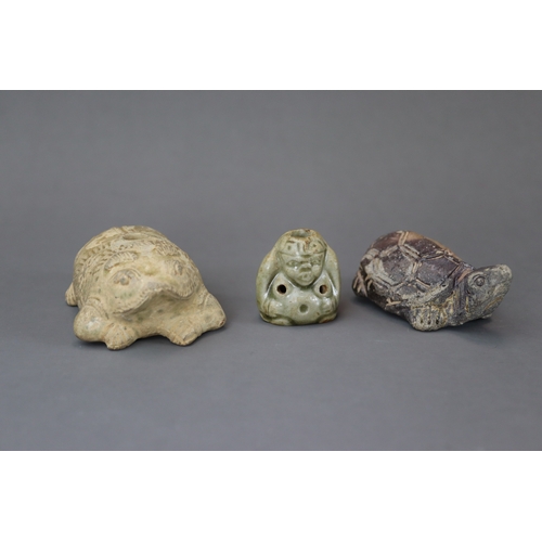 19 - A Group of Three Yue and Yaozhou Celadon Animals, Southern Dynasties and later modelled in frog figu... 