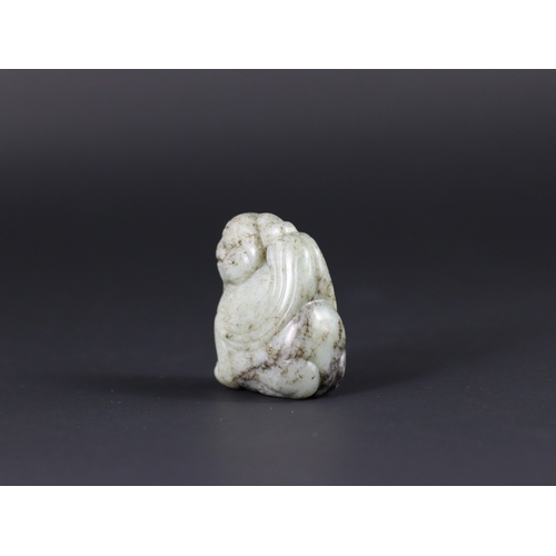 194 - A Grey Jade Fabulous Animal Pendant, Ming dynasty,  the softly carved winged horned beast seated upr... 