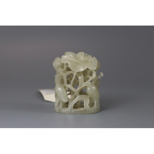 197 - A Good Pale Celadon Jade Hat Finial, Yuan/Ming dynasty, finely carved in deep openwork with cranes a... 