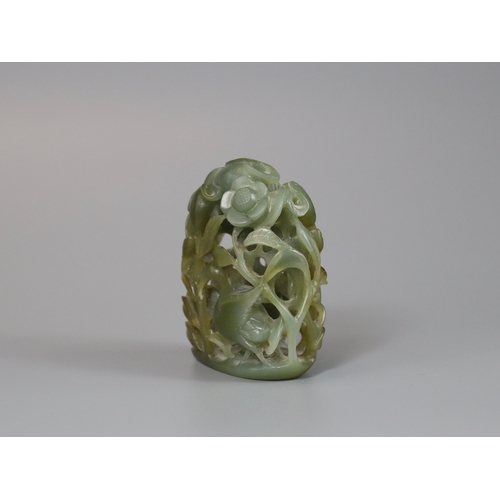 198 - A Sage Green Jade Hat Finial, Yuan/Ming dynasty, well carved from a pebble in deep openwork, with a ... 