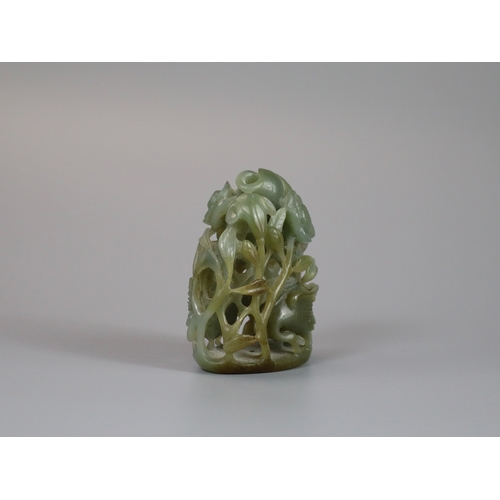 198 - A Sage Green Jade Hat Finial, Yuan/Ming dynasty, well carved from a pebble in deep openwork, with a ... 