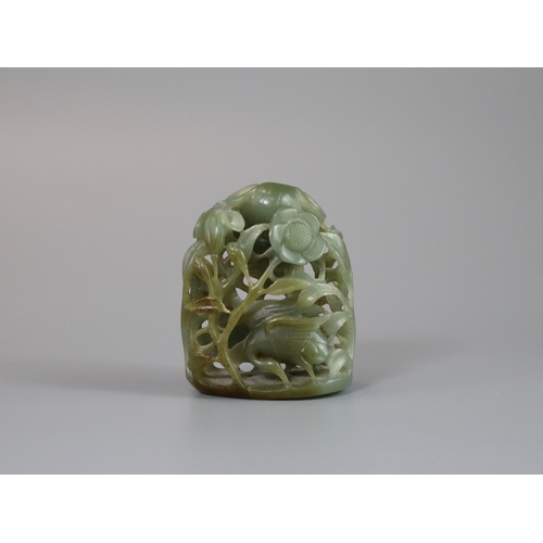 198 - A Sage Green Jade Hat Finial, Yuan/Ming dynasty, well carved from a pebble in deep openwork, with a ... 