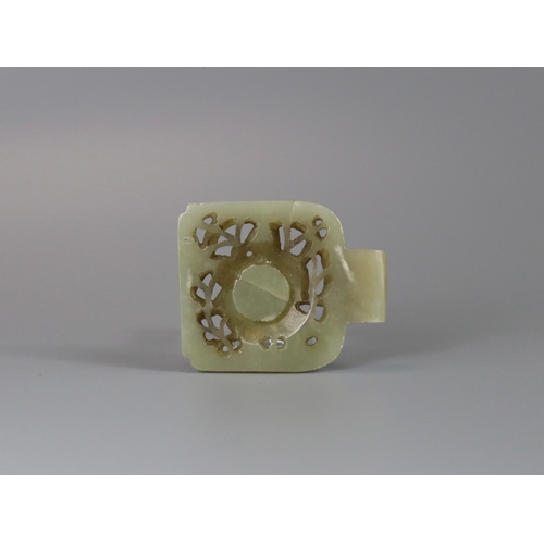 199 - A Jade 'Musician' Belt Buckle, Yuan dynasty or earlier, the celadon stone carved in openwork with th... 