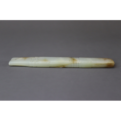 207 - An Archaic Jade Ornament, Shang/Early Western Zhou dynasty, probably a fish, of long slender form an... 