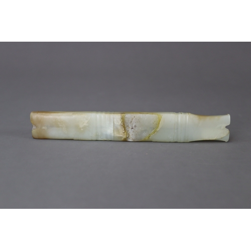 207 - An Archaic Jade Ornament, Shang/Early Western Zhou dynasty, probably a fish, of long slender form an... 