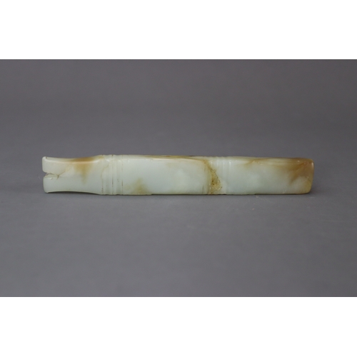 207 - An Archaic Jade Ornament, Shang/Early Western Zhou dynasty, probably a fish, of long slender form an... 